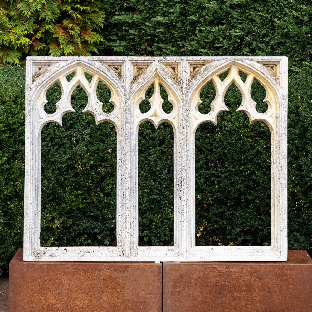 Weathered composition stone Gothic window